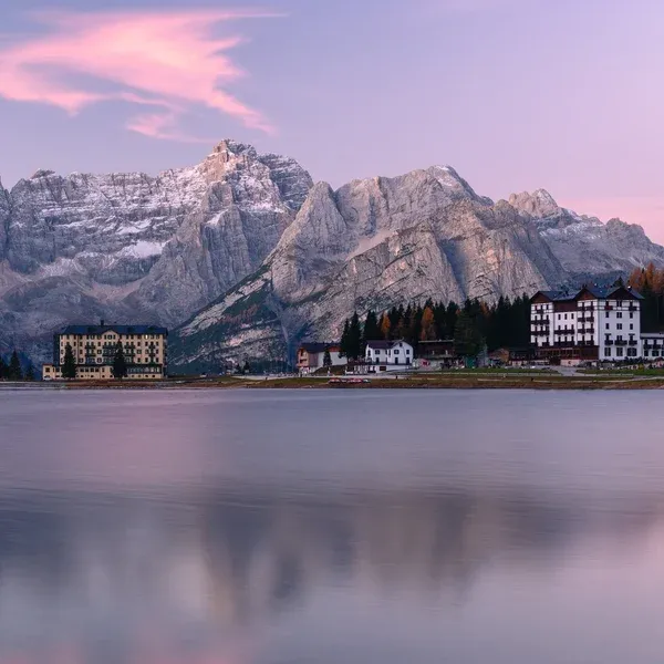Lake Misurina reflecting the Cadini di Misurina and surrounding peaks on a calm morning