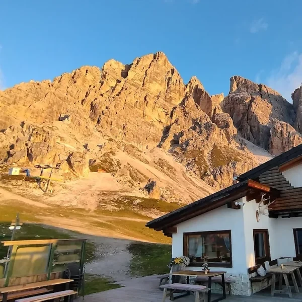 Rifugio Pomedes below the jagged Tofane peaks in the Cortina Dolomites