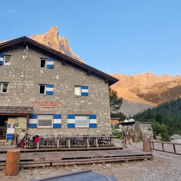 Rifugio Vandelli near the turquoise waters of Lago di Sorapis in the Cortina Dolomites