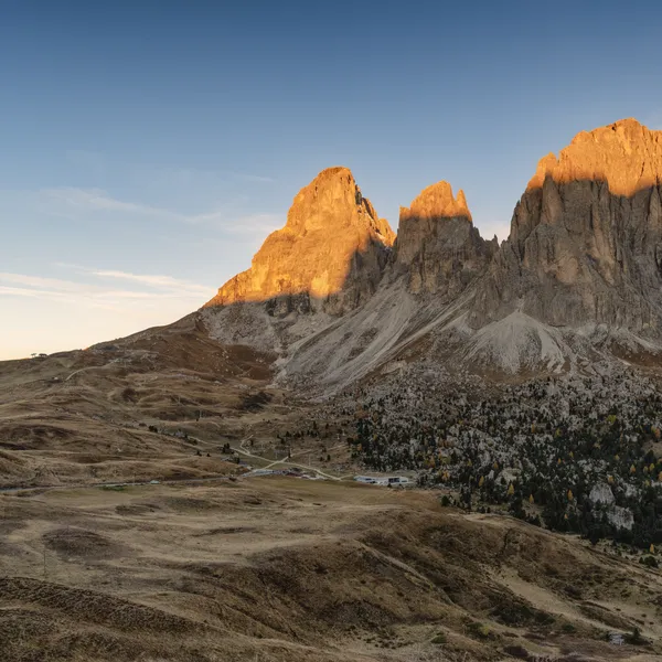 The Sassolungo in first light, seen from Passo Sella